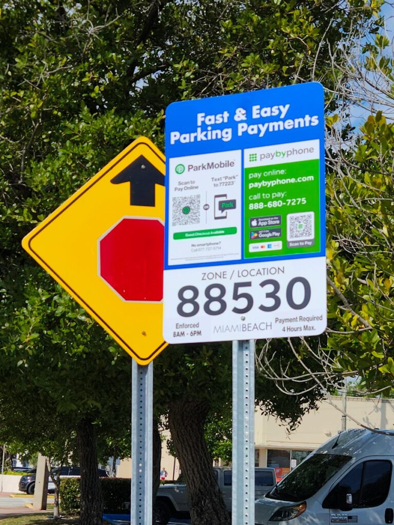 A street sign with a stop sign on it