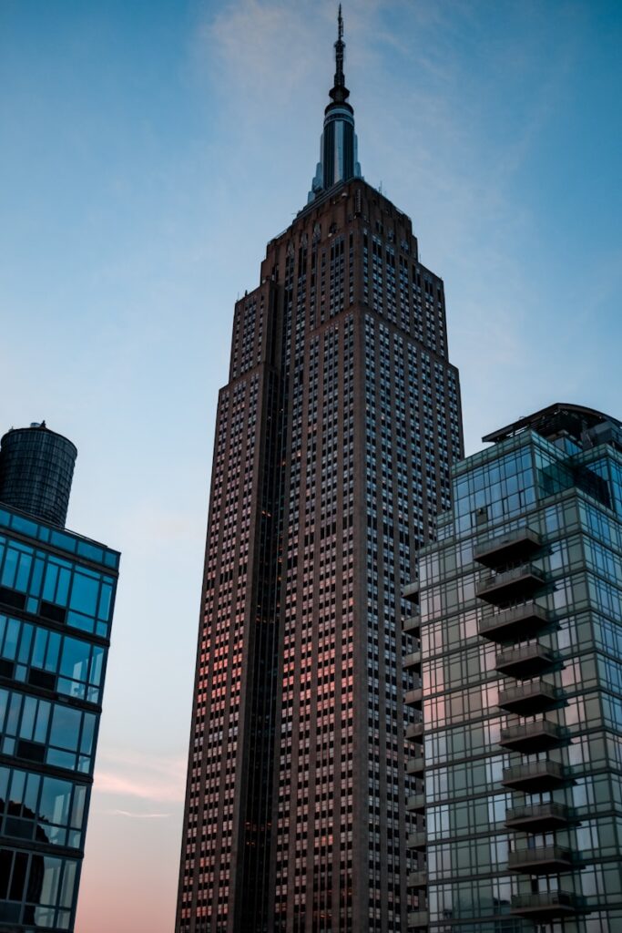 a tall building with a clock on the top of it