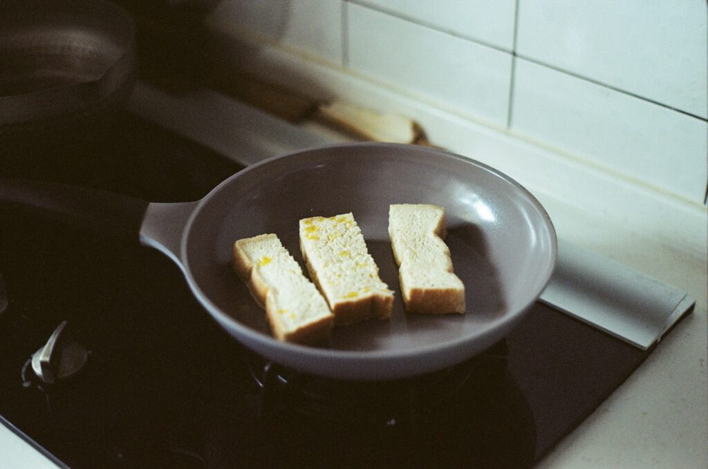 brown bread on black ceramic plate