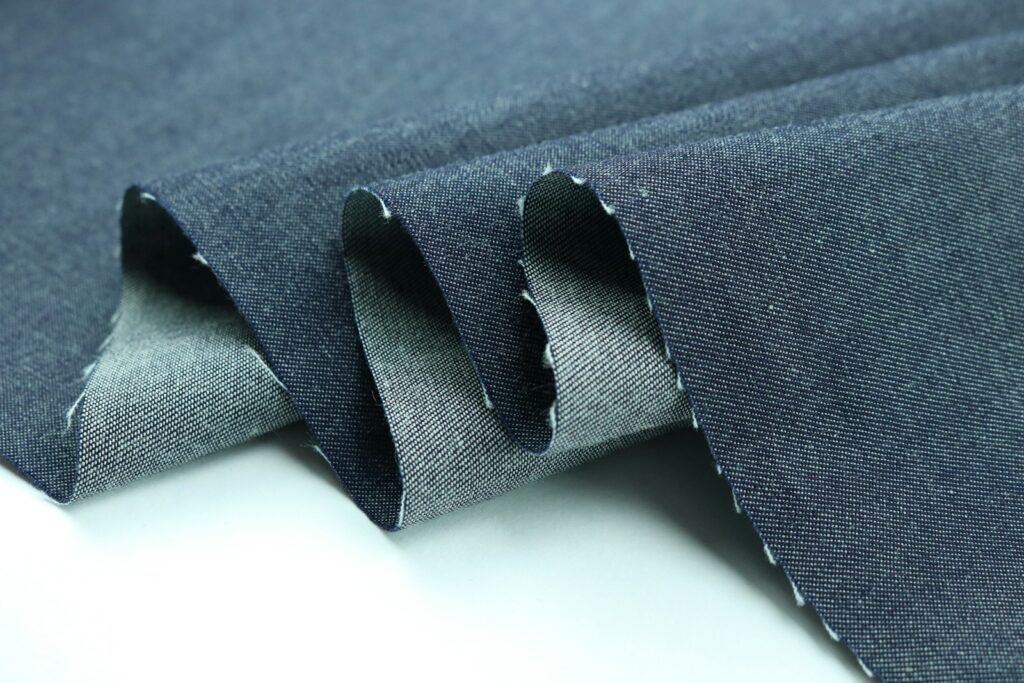 black strap on blue textile