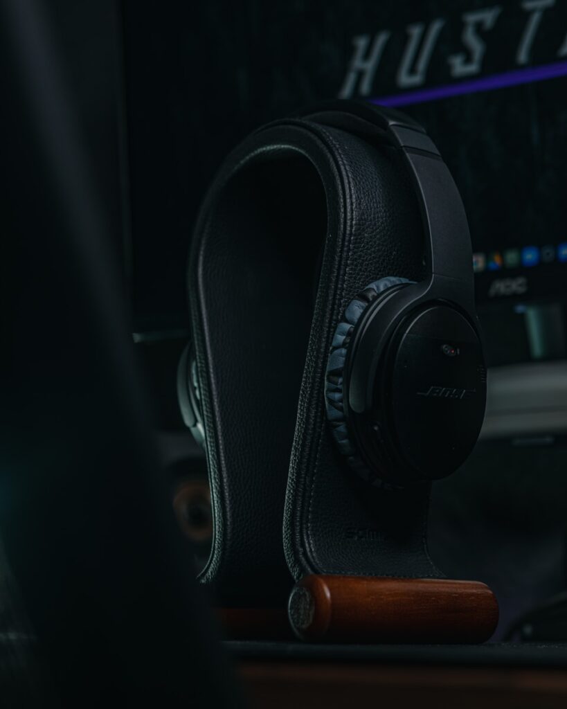 a close up of a pair of headphones on a desk