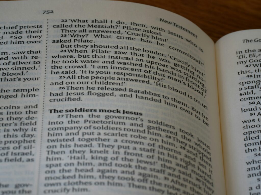 a close up of an open book on a table