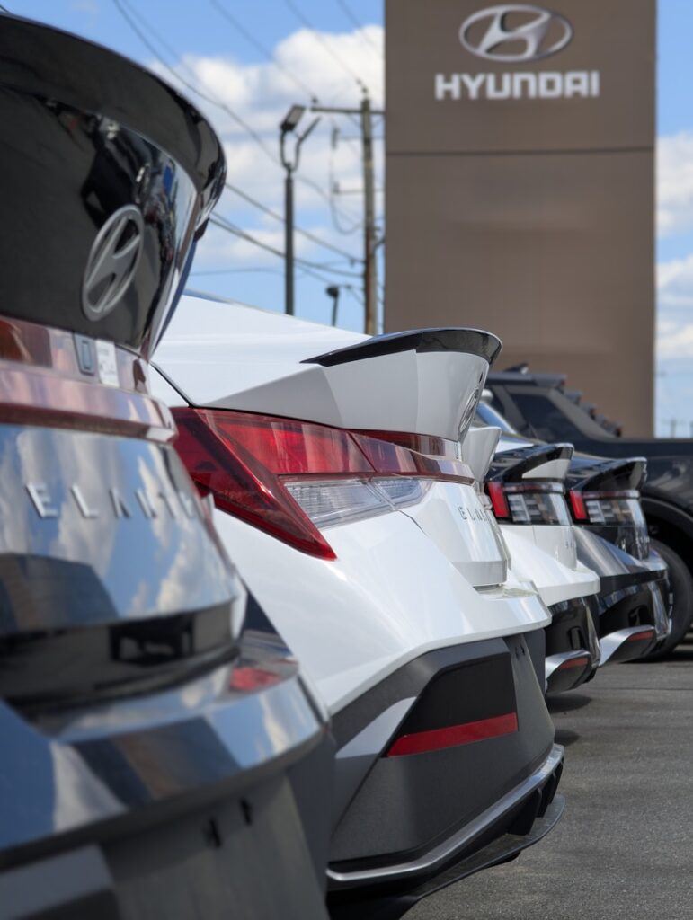 Hyundai cars are parked at the dealership.