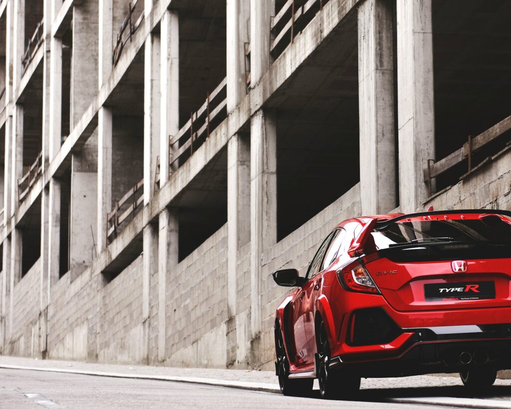 red Honda vehicle