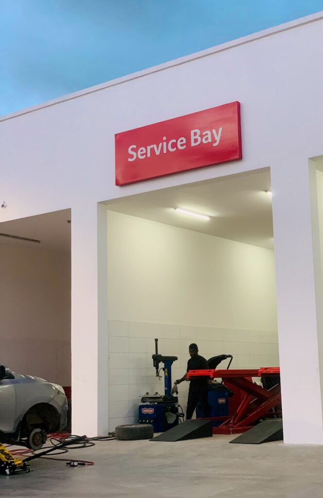 A service bay with a car in the garage