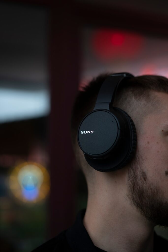 a man with headphones on his ears