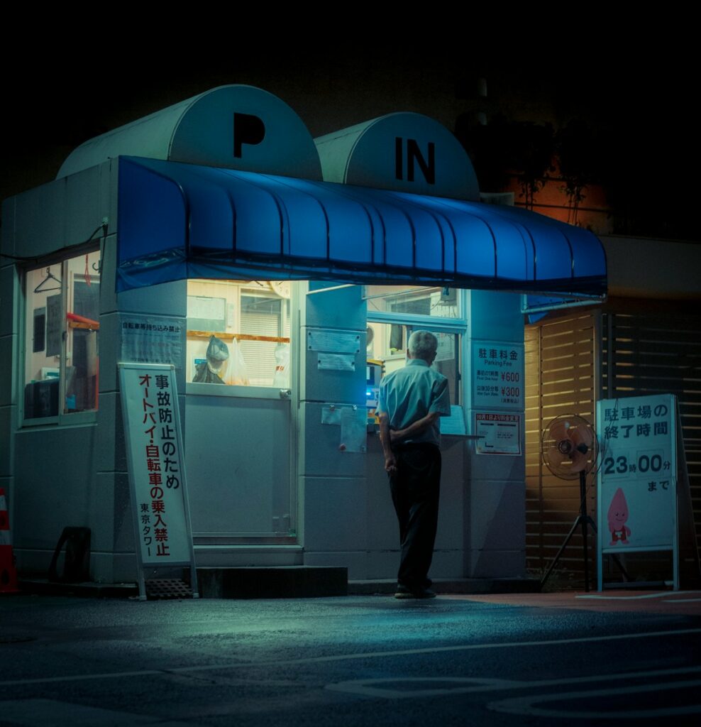 Man at a late night service window