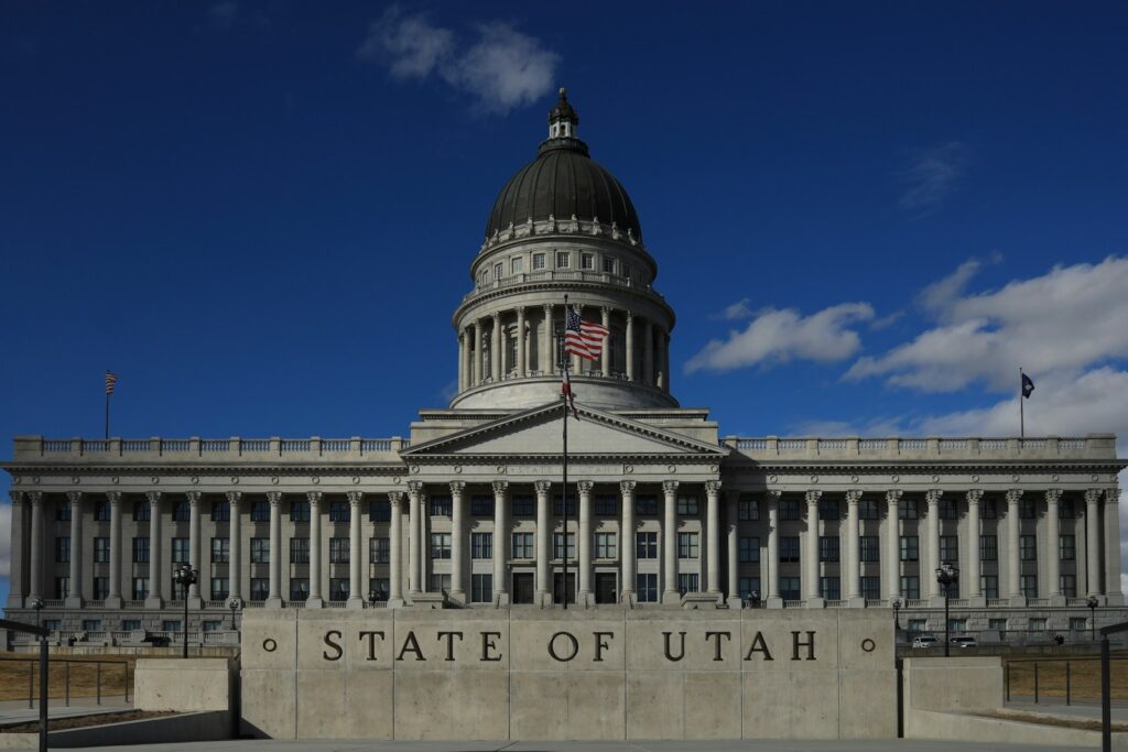 The state of utah building is shown on a sunny day