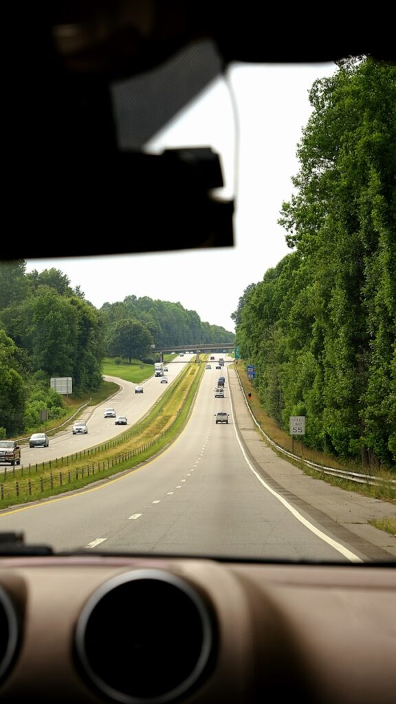 a view of a highway from inside a vehicle