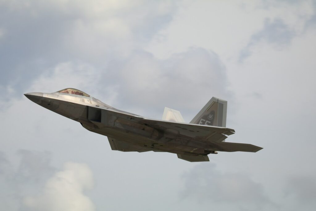 a jet flying in the sky